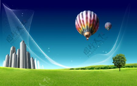 草地与高楼大厦热气球图片