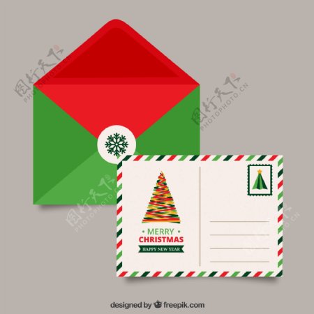 绿色红色信封的圣诞明信片