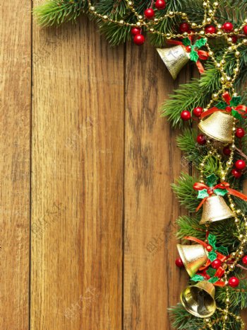 圣诞铃铛与木板图片