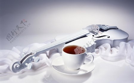 茶杯茶叶小提琴图片