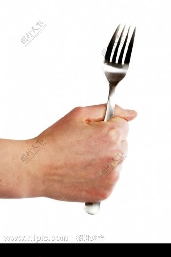 手握叉子图片