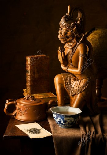 佛像与茶摄影图片
