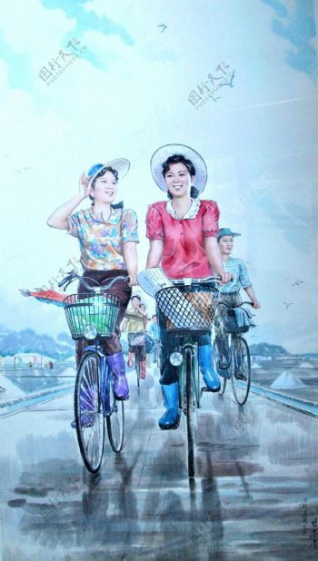 路上骑自行车的行人油画图片