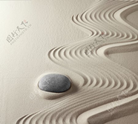 细沙与鹅卵石背景图片