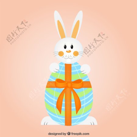 卡通抱彩蛋的兔子