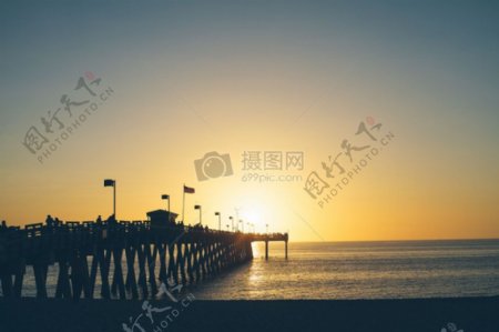 大海蓝天日落阳光沙滩水海洋日出码头地平线岸码头甲板上平静