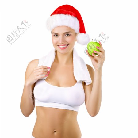 戴着圣诞帽的健身女性图片