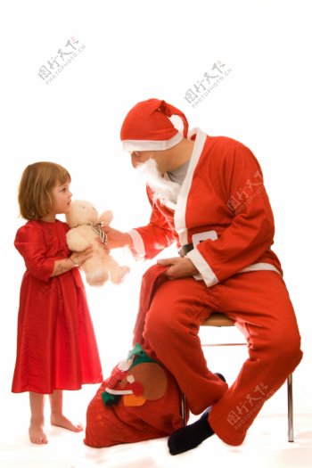 圣诞老人与儿童摄影图片