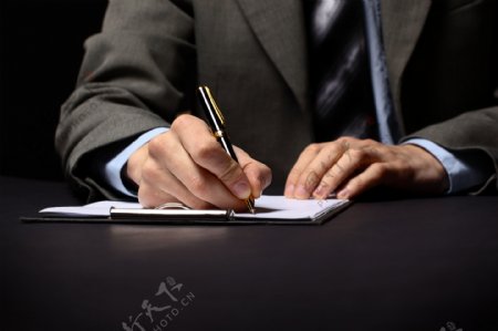 签字的商务男士图片