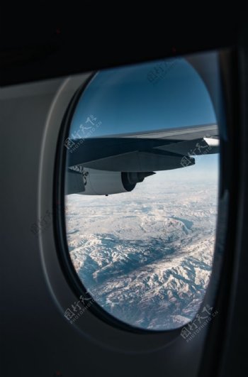 飞机窗户高空云层背景海报素材图片